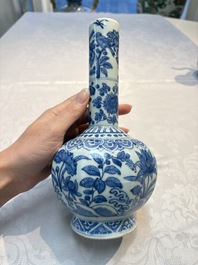A Chinese blue and white bottle vase with floral design, hare mark, Wanli