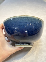 A Chinese blue-glazed 'Hatcher Cargo' bowl with incised dragons, Transitional period
