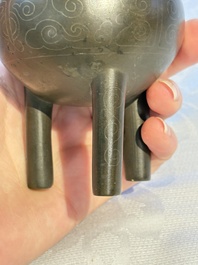A Chinese silver-inlaid bronze tripod censer with clouds design, 19th C.