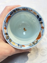 A rare Chinese famille verte reticulated double-walled cup and saucer, artemisia leaf mark, Kangxi