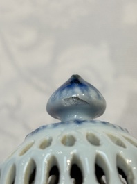A rare Chinese blue and white reticulated double-walled ewer and cover with floral design, Kangxi