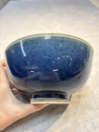 A Chinese blue-glazed 'Hatcher Cargo' bowl with incised dragons, Transitional period