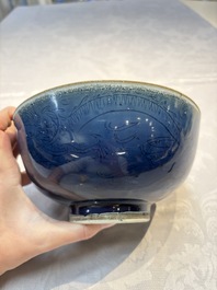 A Chinese blue-glazed 'Hatcher Cargo' bowl with incised dragons, Transitional period