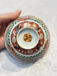 A rare Chinese famille verte reticulated double-walled cup and saucer, artemisia leaf mark, Kangxi