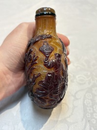 A very large Chinese brown-overlay amber glass 'Ba Xian Zhu Shou 八仙祝壽&lsquo; table snuff bottle, 19th C.