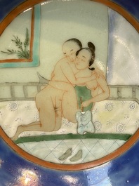 A Chinese famille verte 'Erotic Subject' plate, 19th C.