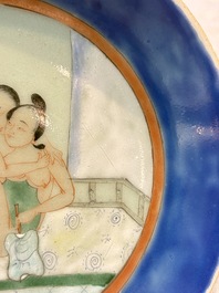 A Chinese famille verte 'Erotic Subject' plate, 19th C.