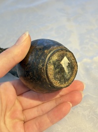 A small Chinese bronze vase with a chilong on a wooden stand, Yuan