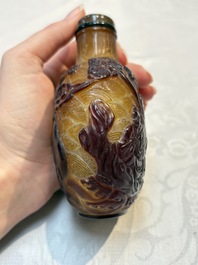 A very large Chinese brown-overlay amber glass 'Ba Xian Zhu Shou 八仙祝壽&lsquo; table snuff bottle, 19th C.