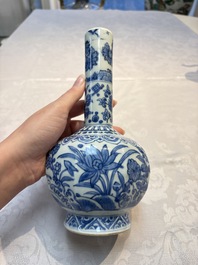 A Chinese blue and white bottle vase with floral design, hare mark, Wanli