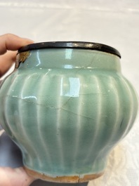 A Chinese Longquan celadon 'Lotus' jar with bronze mount, Song