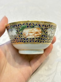 A Chinese famille rose gilt-decorated cup and saucer with figural design, Jiaqing