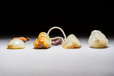 Four Chinese celadon and russet jade carvings, Qing