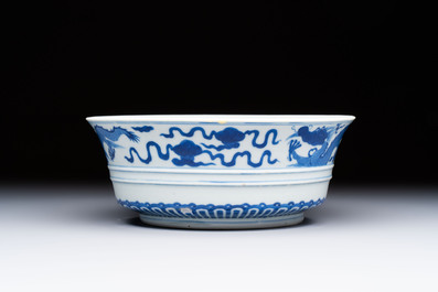 A Chinese blue and white 'Dragon' bowl, Xuande mark, 19th C.