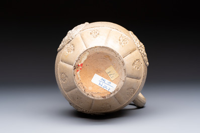 A Siegburg stoneware jug with mounted pewter lid, dated 1594