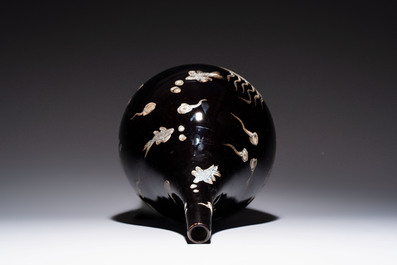 A Chinese black-glazed reverse-decorated bottle vase, 20th C.