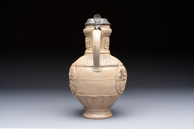 A Siegburg stoneware jug with mounted pewter lid, dated 1594
