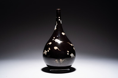 A Chinese black-glazed reverse-decorated bottle vase, 20th C.