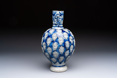 A Westerwald stoneware jug with a lion's head and moulded floral design, Germany, 17th C.