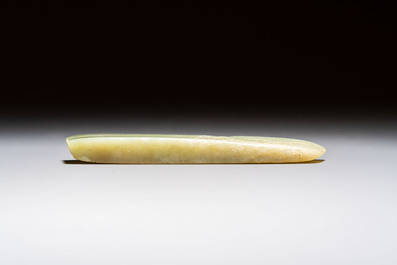 A Chinese celadon jade snuff bottle, a plaque and a ritual stick, Han and later