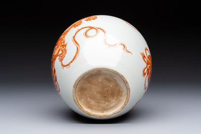 A Chinese iron-red 'Buddhist Lions' vase, 20th C.