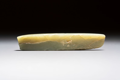 A Chinese celadon jade snuff bottle, a plaque and a ritual stick, Han and later