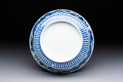 A Chinese blue and white 'Dragon' bowl, Xuande mark, 19th C.