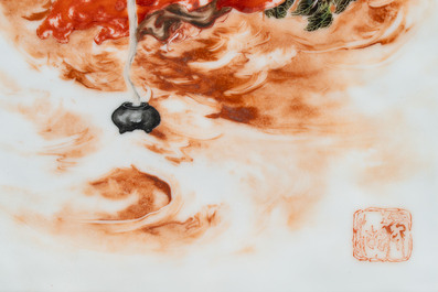 A fine Chinese iron-red and grisaille 'Luohan' plaque, signed Wang Bu 王步, 20th C.
