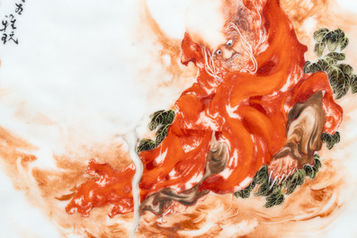 A fine Chinese iron-red and grisaille 'Luohan' plaque, signed Wang Bu 王步, 20th C.