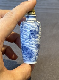 Two Chinese blue, white and copper-red 'Mythical Animals' snuff bottles, Qianlong mark and of the period