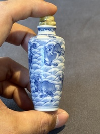 Two Chinese blue, white and copper-red 'Mythical Animals' snuff bottles, Qianlong mark and of the period