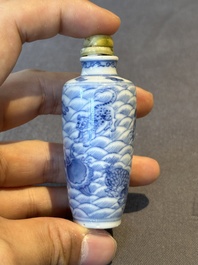 Two Chinese blue, white and copper-red 'Mythical Animals' snuff bottles, Qianlong mark and of the period