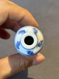 Two Chinese blue, white and copper-red 'Mythical Animals' snuff bottles, Qianlong mark and of the period