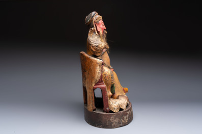 A large Chinese gilt-lacquered and polychrome wooden figure of Guandi, 19th C.