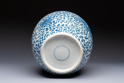 A Chinese blue and white 'Lotus Scroll' vase, 19th C.