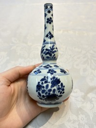 A Chinese blue and white covered ewer, a rose water sprinkler, a covered cup and saucer, jade 玉 and twin-fish mark, Kangxi