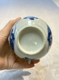 A Chinese blue and white ewer and cover with floral design, Kangxi