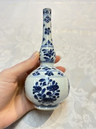 A Chinese blue and white covered ewer, a rose water sprinkler, a covered cup and saucer, jade 玉 and twin-fish mark, Kangxi