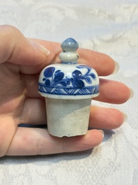 A Chinese blue and white ewer and cover with floral design, Kangxi