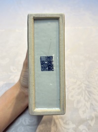 A Chinese blue, white and copper-red celadon-ground tea caddy with floral and bamboo design, Qianlong mark and of the period