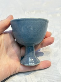 Four Chinese blue-glazed 'Hatcher Cargo' stem cups, Transitional period