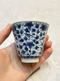 A Chinese blue and white covered ewer, a rose water sprinkler, a covered cup and saucer, jade 玉 and twin-fish mark, Kangxi