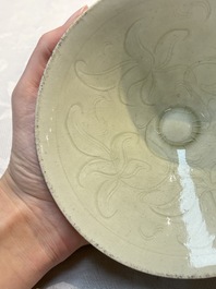A Chinese qingbai tea bowl with incised floral design, 20th C.