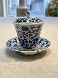 A Chinese blue and white covered ewer, a rose water sprinkler, a covered cup and saucer, jade 玉 and twin-fish mark, Kangxi
