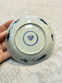 A Chinese blue and white covered ewer, a rose water sprinkler, a covered cup and saucer, jade 玉 and twin-fish mark, Kangxi