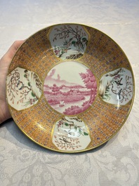 A Chinese famille rose puce-enamelled 'Riverscape' plate, cup and saucer, Jiaqing