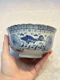 Three Chinese blue and white 'Fish' bowls and a bottle vase, Kangxi marks, 19th C.