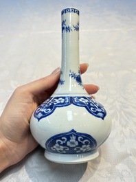 Three Chinese blue and white 'Fish' bowls and a bottle vase, Kangxi marks, 19th C.