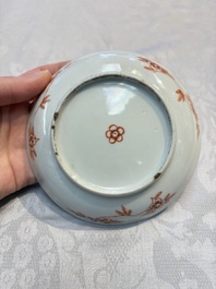 Five Chinese famille verte cups and saucers with floral design, 19th C.