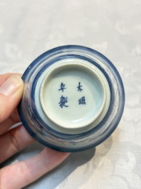 Three Japanese Arita blue and white &lsquo;Van Frytom&rsquo; cups and four shield-shaped saucers, Ming and Chenghua mark, ca. 1700